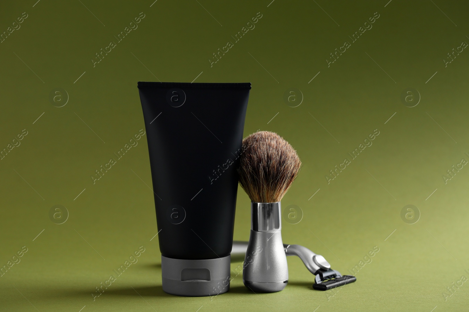 Photo of Set of shaving equipment and men's cosmetic product on color background