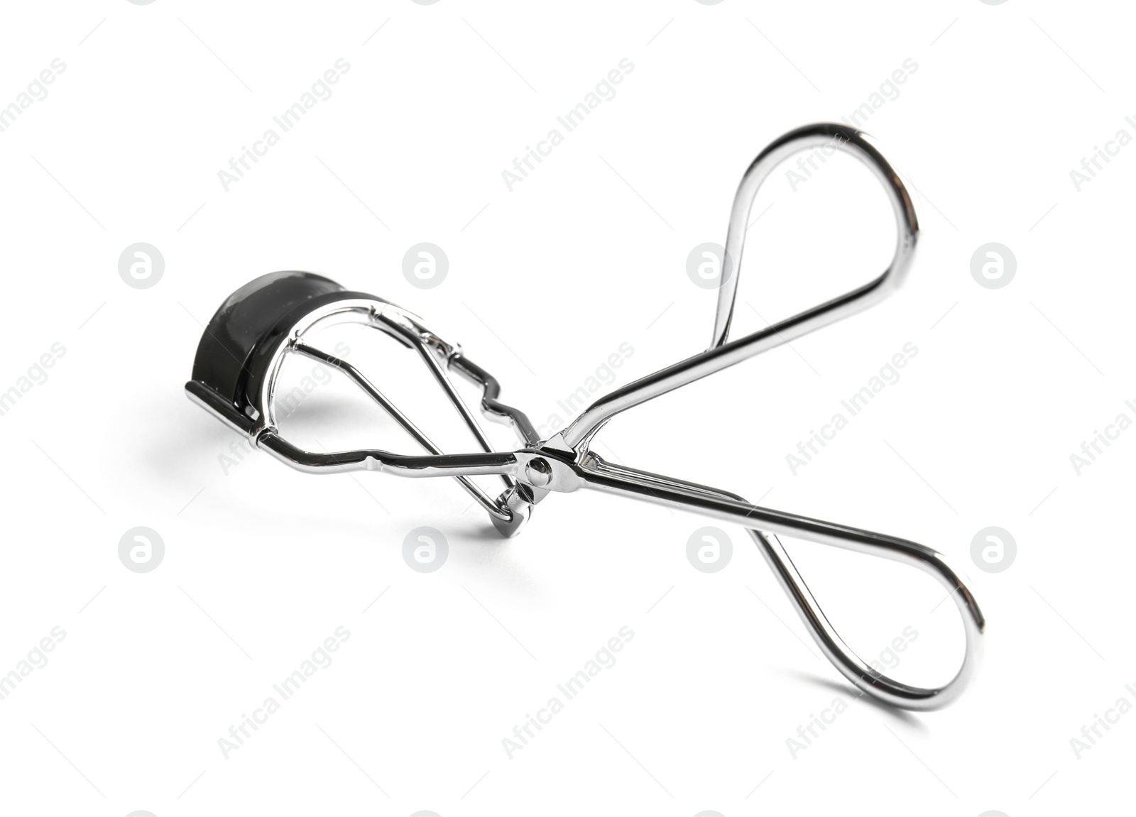 Photo of Eyelash curler on white background