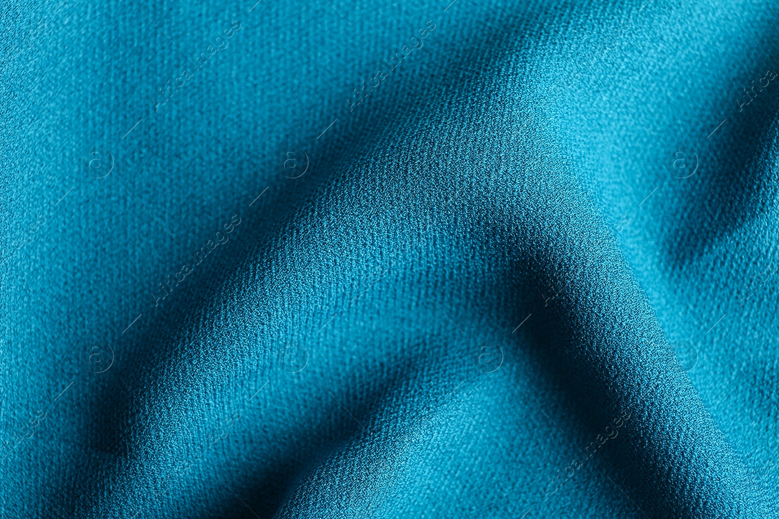 Photo of Texture of beautiful blue fabric as background, closeup