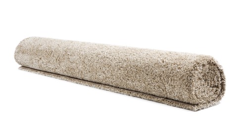 Photo of Rolled fuzzy carpet on white background. Interior element