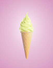 Tasty ice cream in waffle cone on pastel violet background. Soft serve