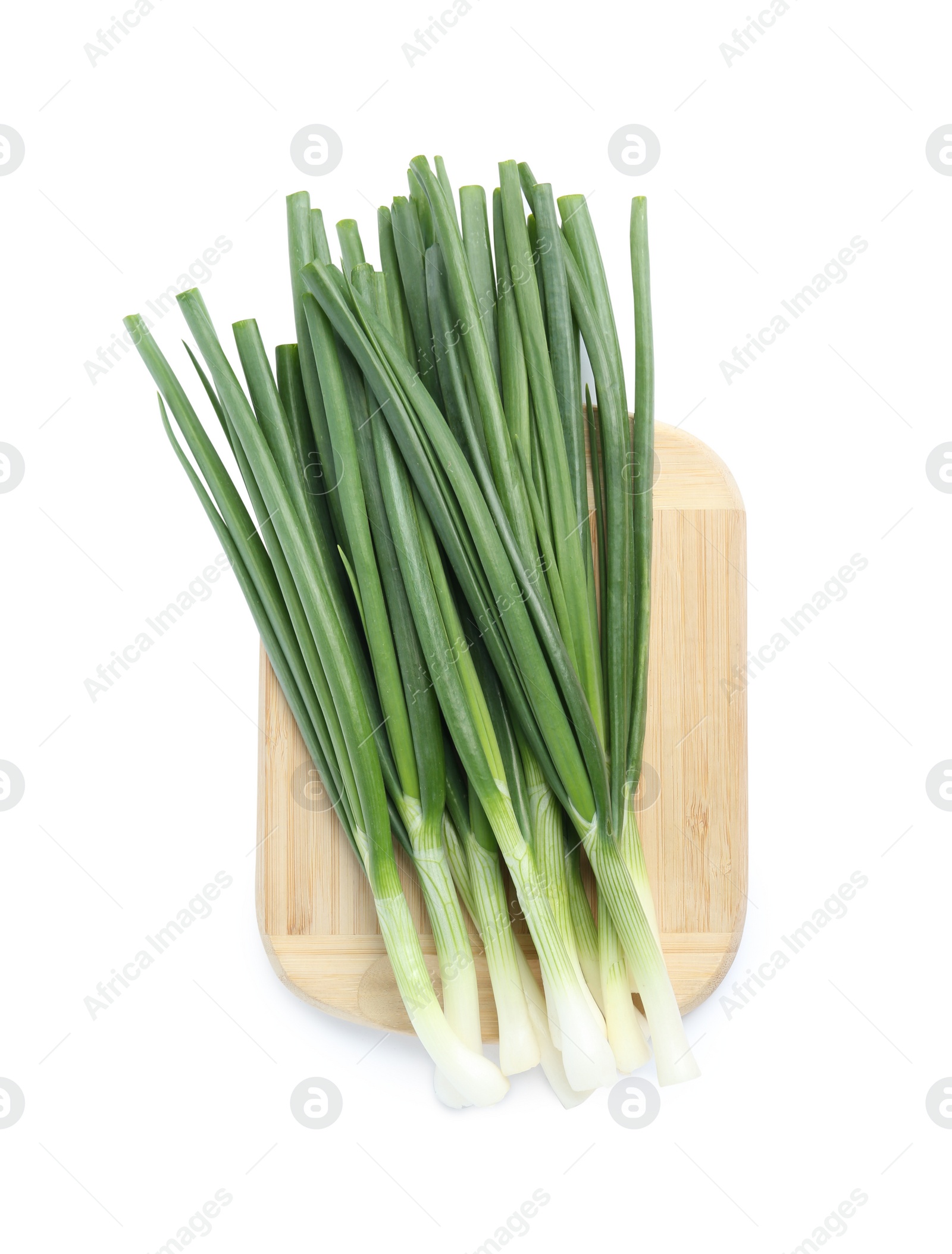 Photo of Fresh green spring onions isolated on white, top view