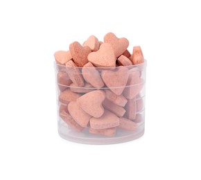Heart shaped vitamins for pets in plastic container isolated on white