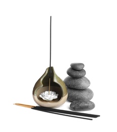 Photo of Aromatic incense sticks and spa stones on white background