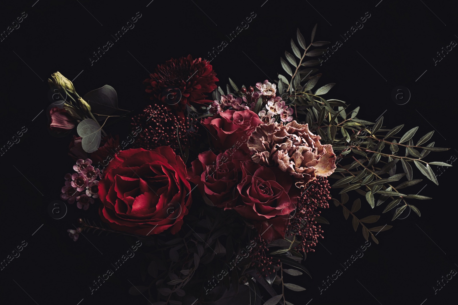 Photo of Beautiful bouquet of different flowers on black background. Floral card design with dark vintage effect