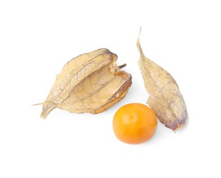 Photo of Ripe physalis fruit with calyx isolated on white, top view