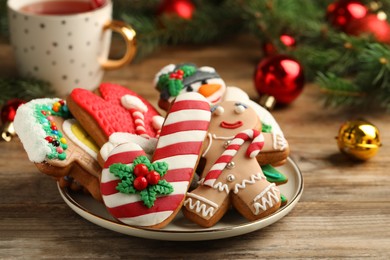 Delicious Christmas cookies on wooden table, closeup