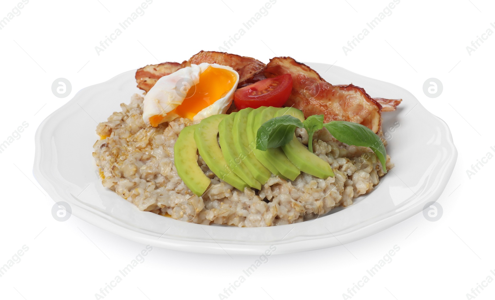 Photo of Delicious boiled oatmeal with egg, bacon, tomato and avocado isolated on white