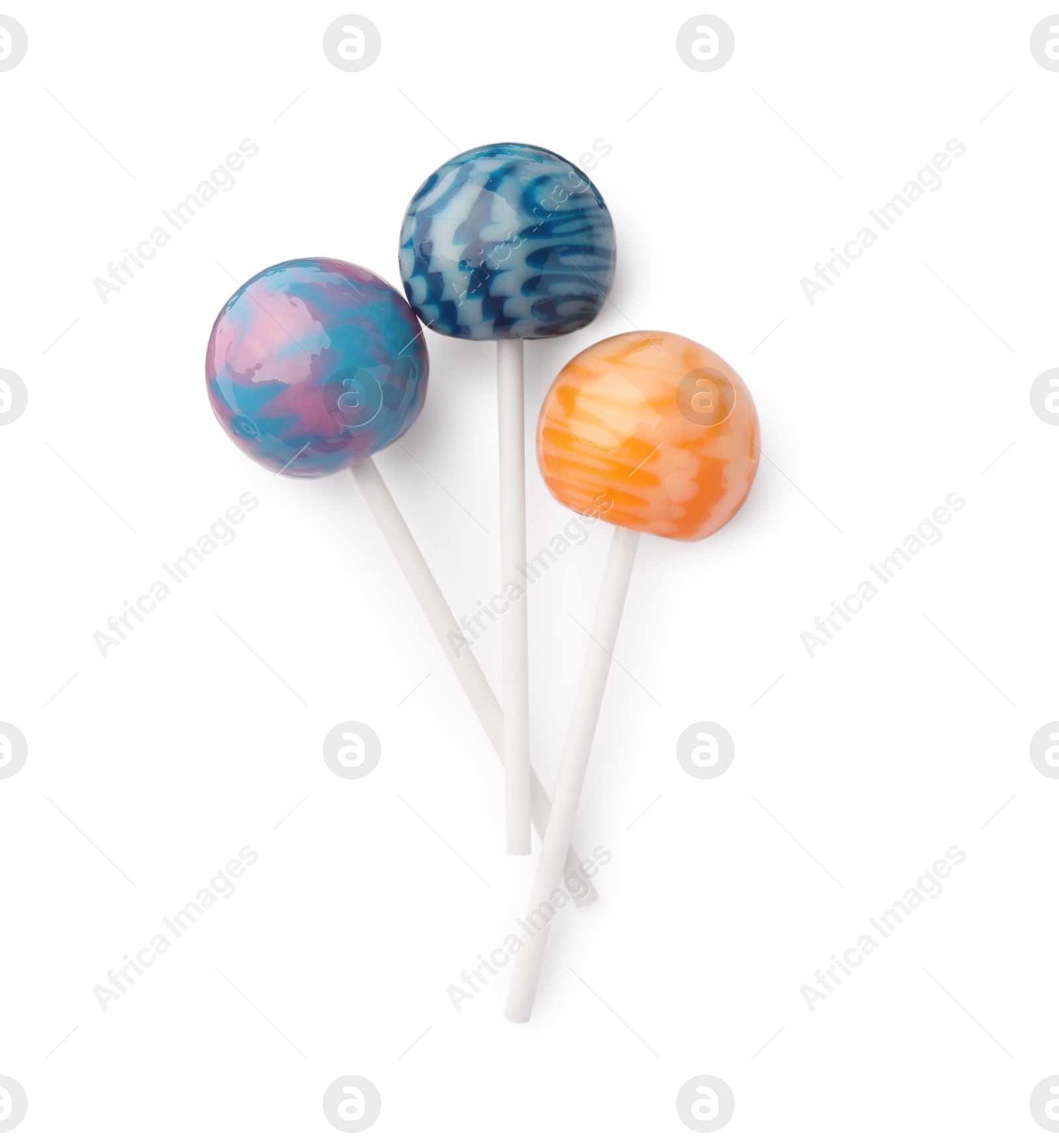 Photo of Tasty lollipops isolated on white, top view