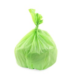 Photo of Green plastic garbage bag isolated on white