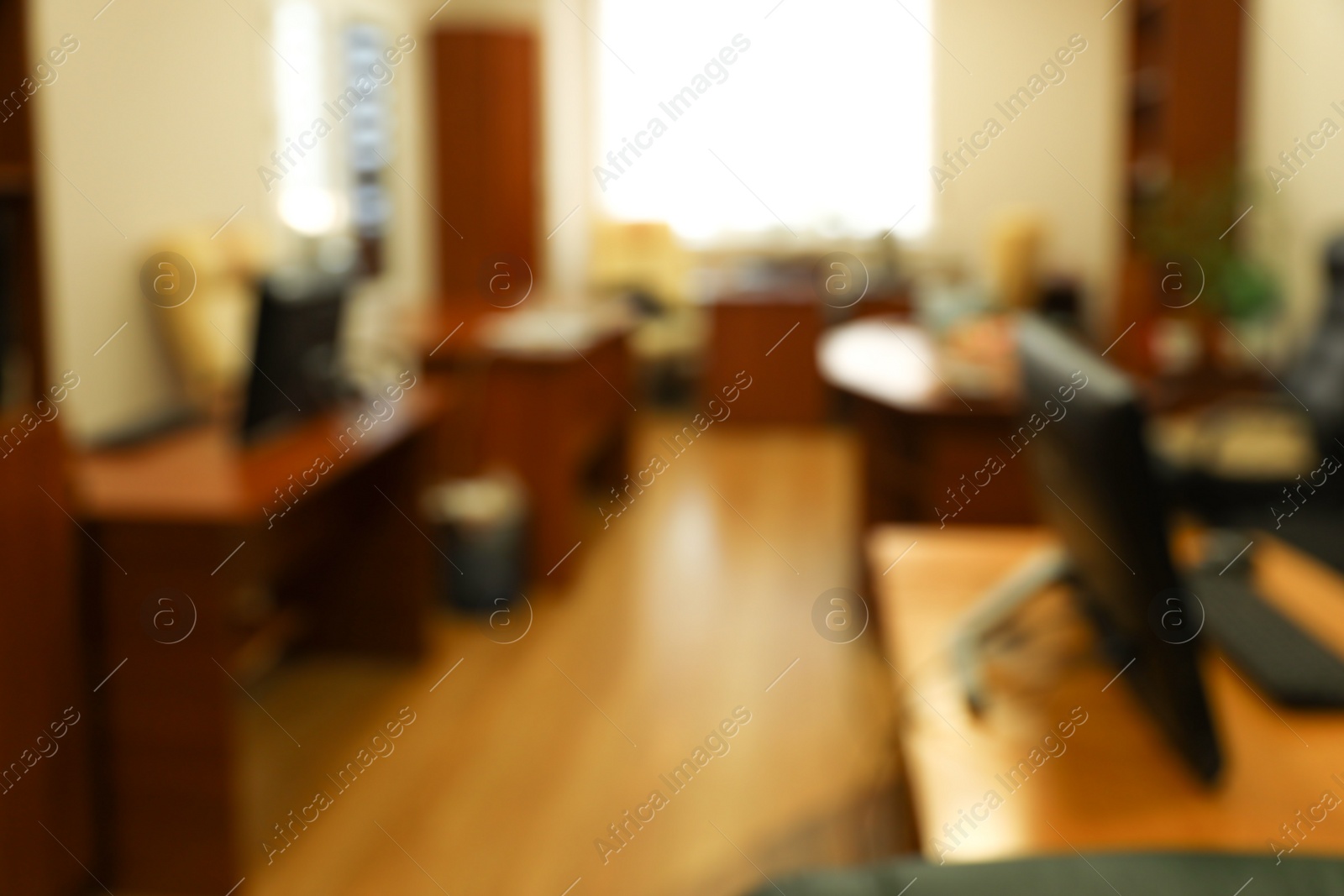 Photo of Blurred view of modern office interior. Bokeh effect