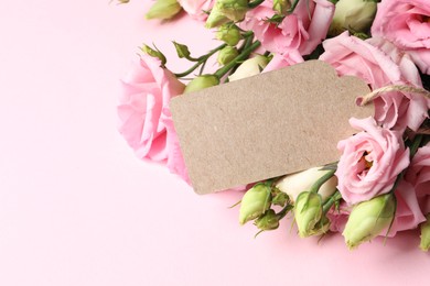 Photo of Happy Mother's Day. Beautiful flowers and blank card on pink background, closeup. Space for text