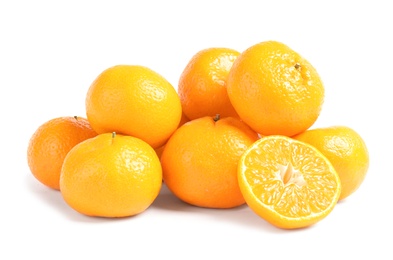 Photo of Tasty ripe tangerines on white background. Citrus fruit