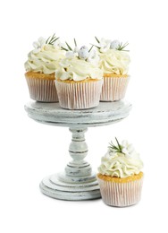 Photo of Tasty Easter cupcakes with vanilla cream isolated on white