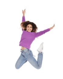 Photo of Beautiful young woman in stylish clothes jumping on white background