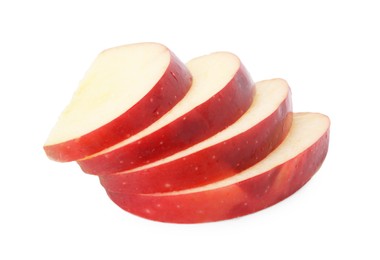 Photo of Slices of ripe red apple isolated on white