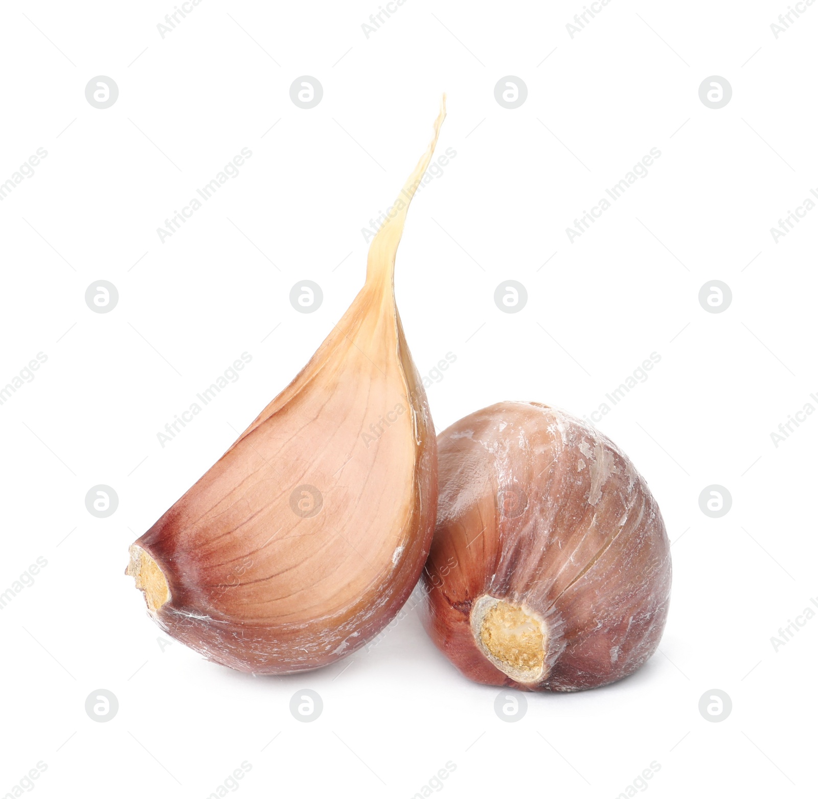 Photo of Fresh organic garlic cloves on white background