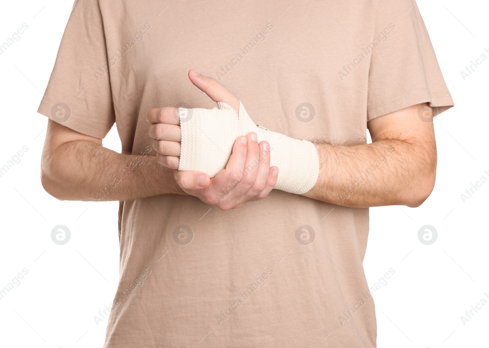 Photo of Man with hand wrapped in medical bandage on white background, closeup