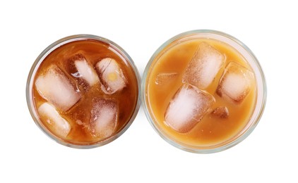 Photo of Glasses of fresh iced coffee isolated on white, top view