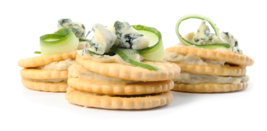 Photo of Delicious crackers with cheese and cucumber on white background