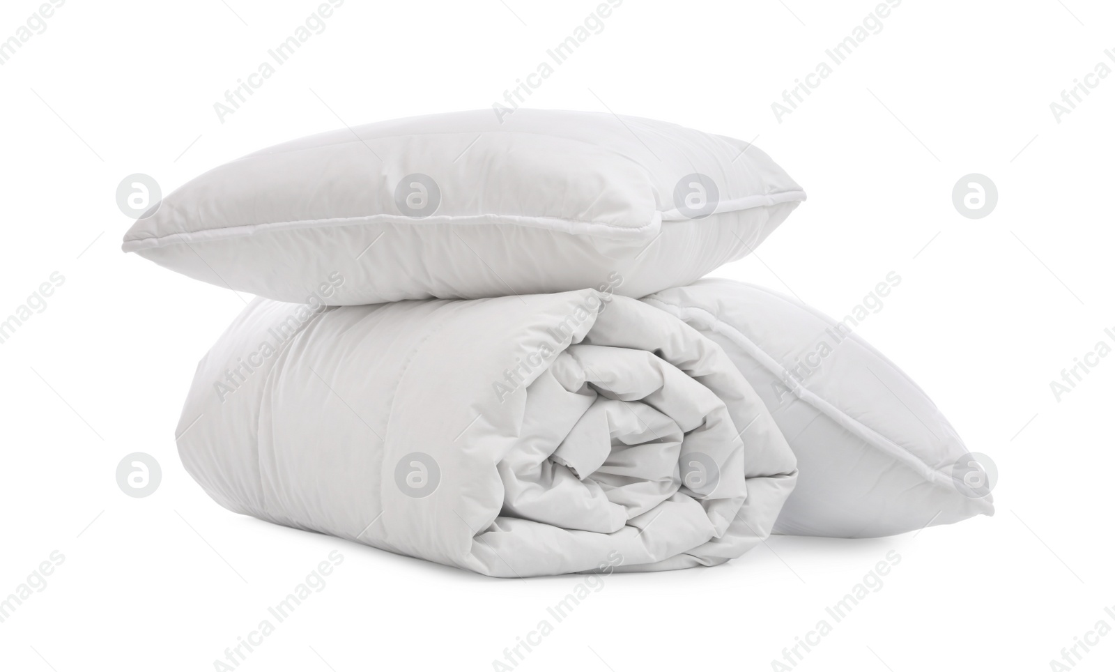 Photo of Soft blanket with pillows on white background