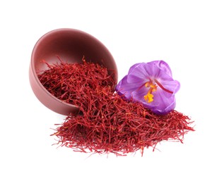 Photo of Dried saffron and crocus flower on white background