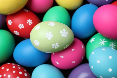 Colorful eggs as background, closeup. Happy Easter