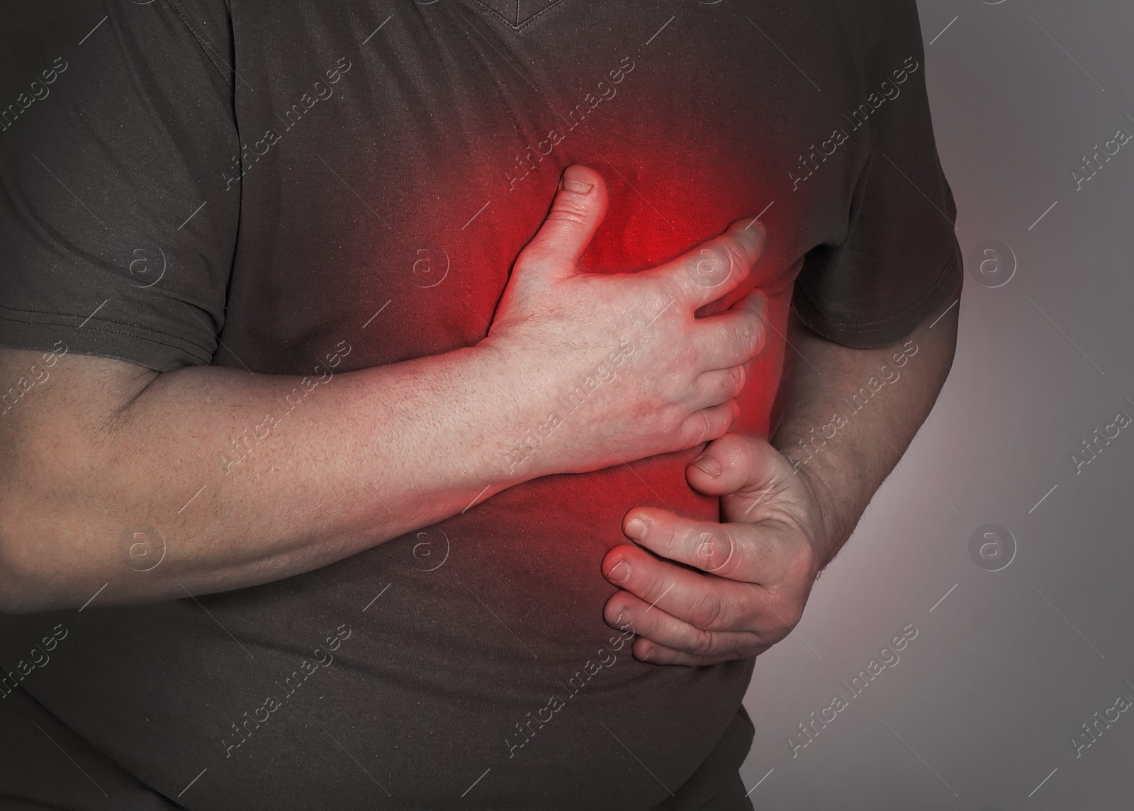 Image of Senior man having heart attack on grey background, closeup