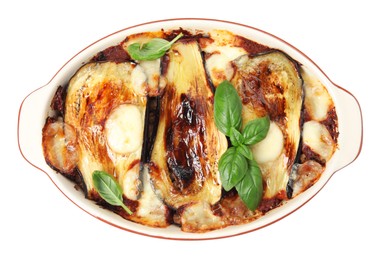 Photo of Delicious eggplant lasagna in baking dish isolated on white, top view