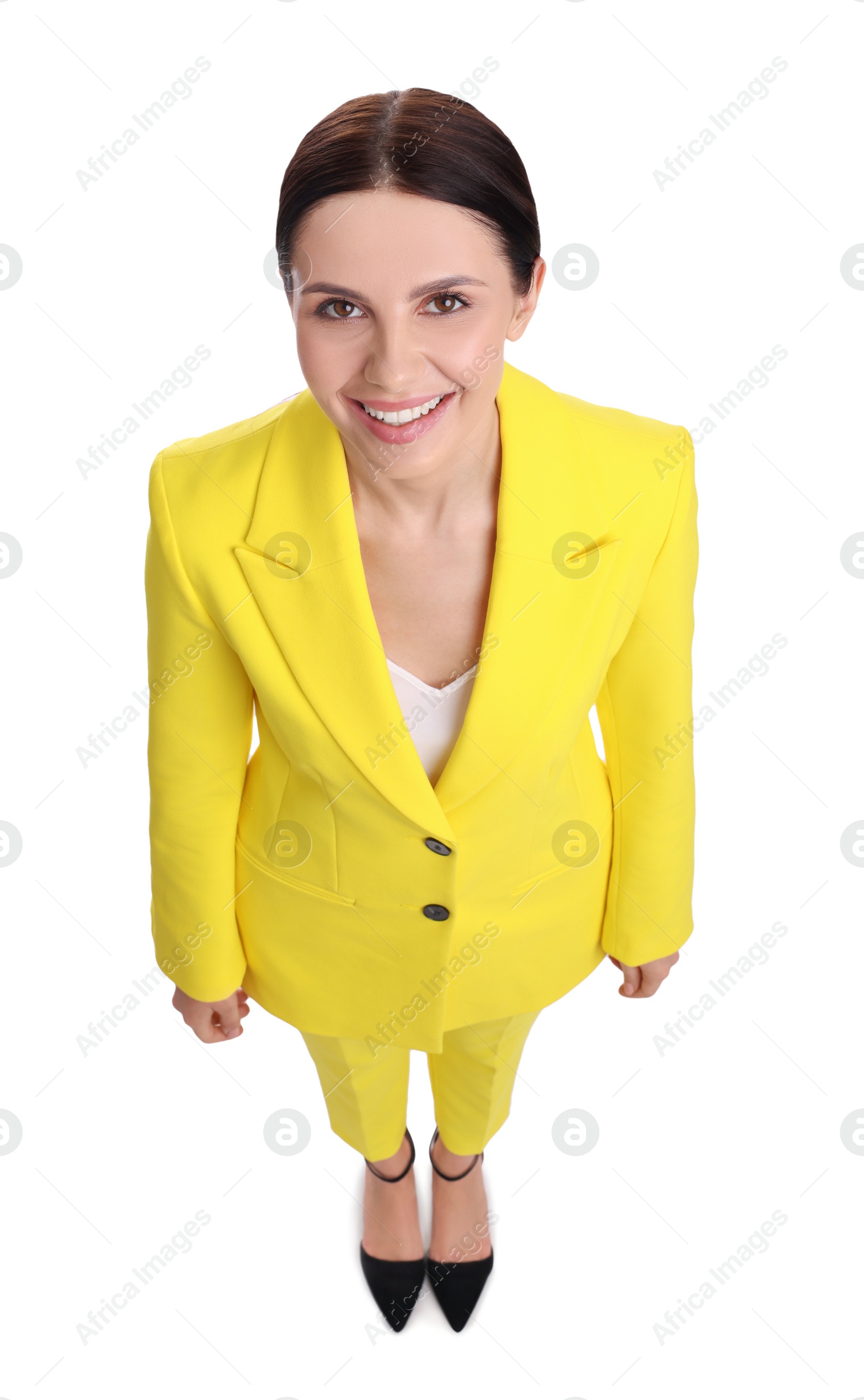 Photo of Beautiful businesswoman in yellow suit on white background, above view