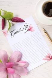 Photo of Guest list, coffee, pen and beautiful flowers on white wooden table, flat lay. Space for text