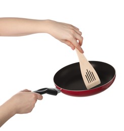 Photo of Woman with spatula and frying pan on white background, closeup