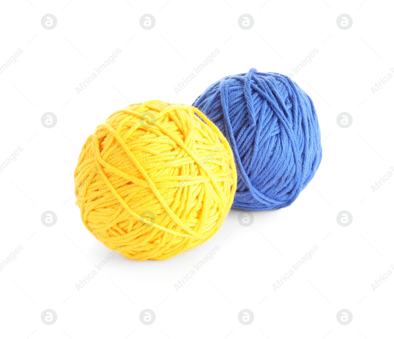 Photo of Soft colorful woolen yarns on white background