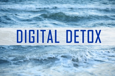 Text Digital Detox and sea waves on background
