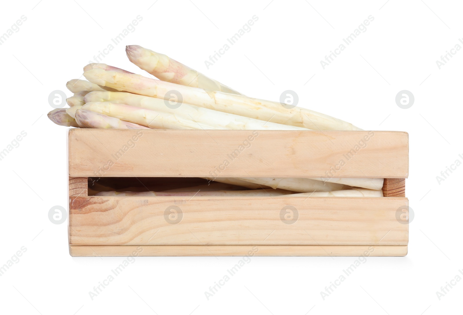 Photo of Fresh ripe asparagus in wooden crate isolated on white