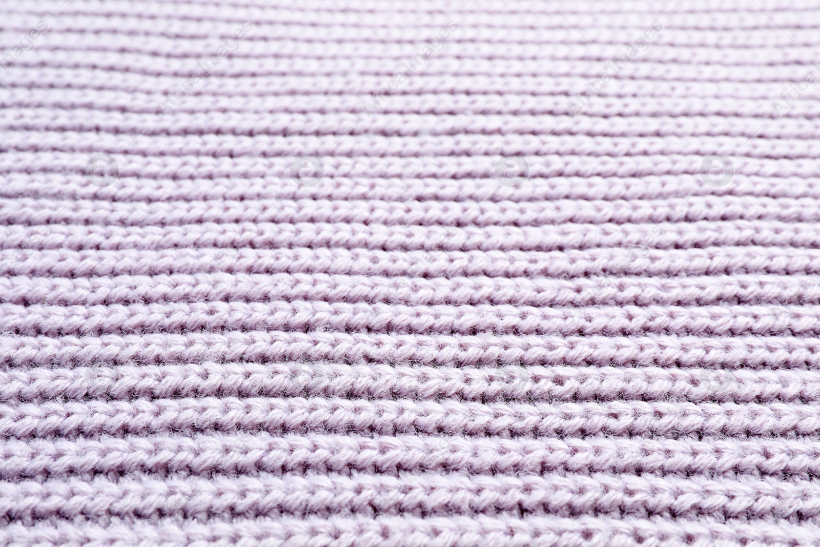 Photo of Light winter sweater as background, closeup view