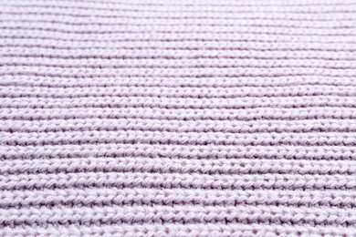 Photo of Light winter sweater as background, closeup view