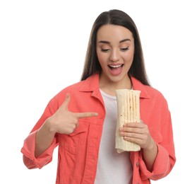 Happy young woman holding tasty shawarma isolated on white