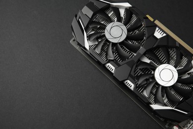 Photo of Computer graphics card on black background, top view. Space for text