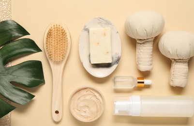 Photo of Bath accessories. Flat lay composition with personal care products on beige background