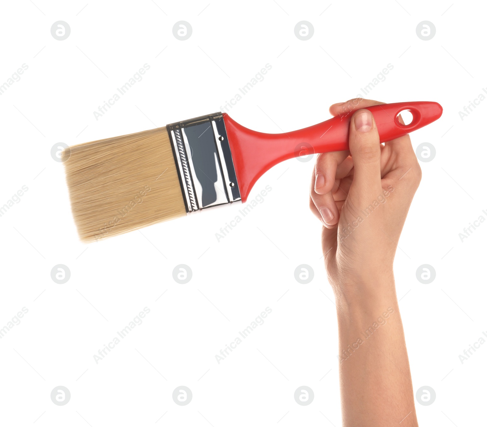 Photo of Woman holding paint brush on white background, closeup