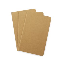 Photo of Stylish kraft planners on white background, top view