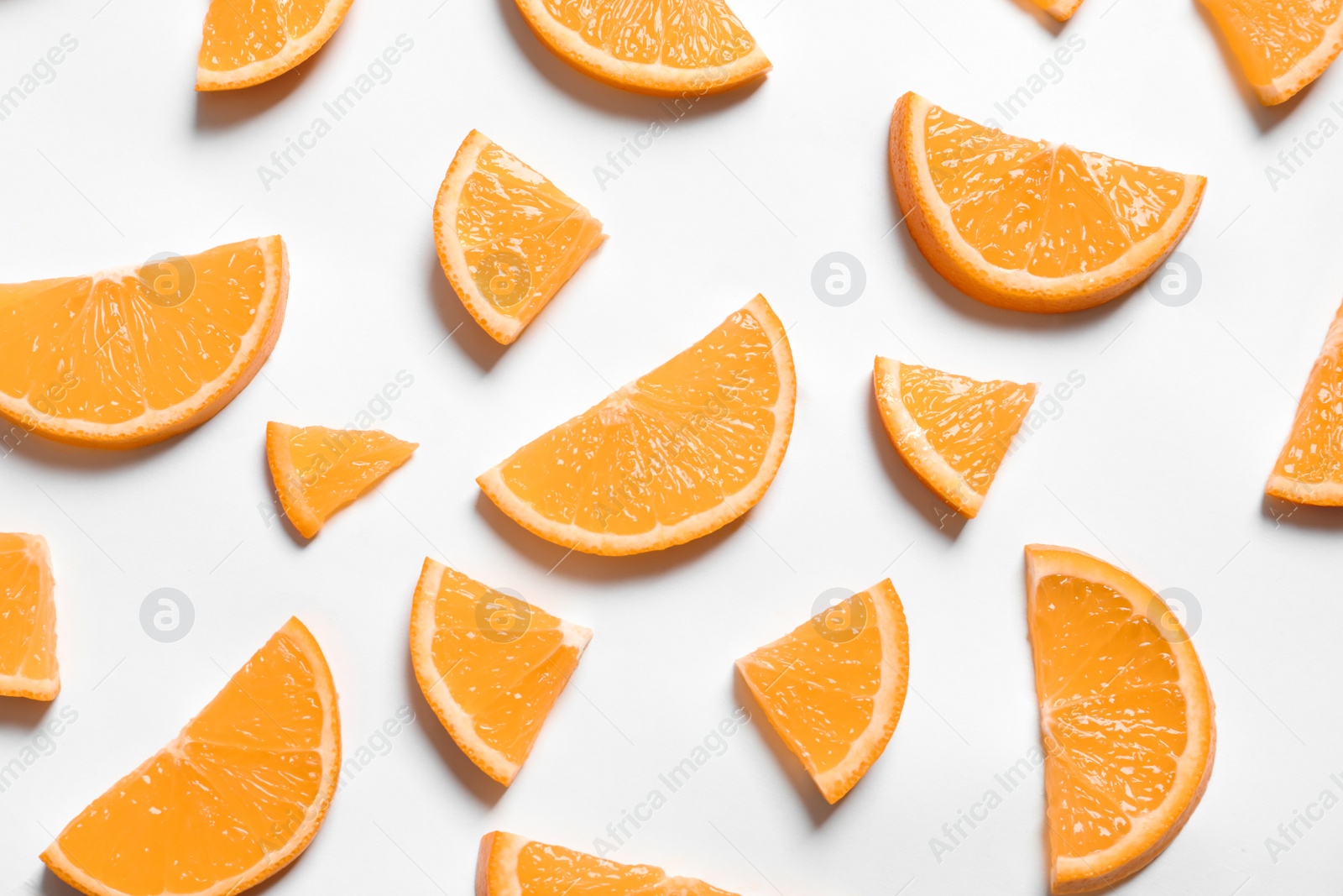 Photo of Composition with orange slices on white background, top view
