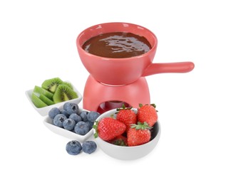 Photo of Fondue pot with melted chocolate, fresh berries and kiwi isolated on white