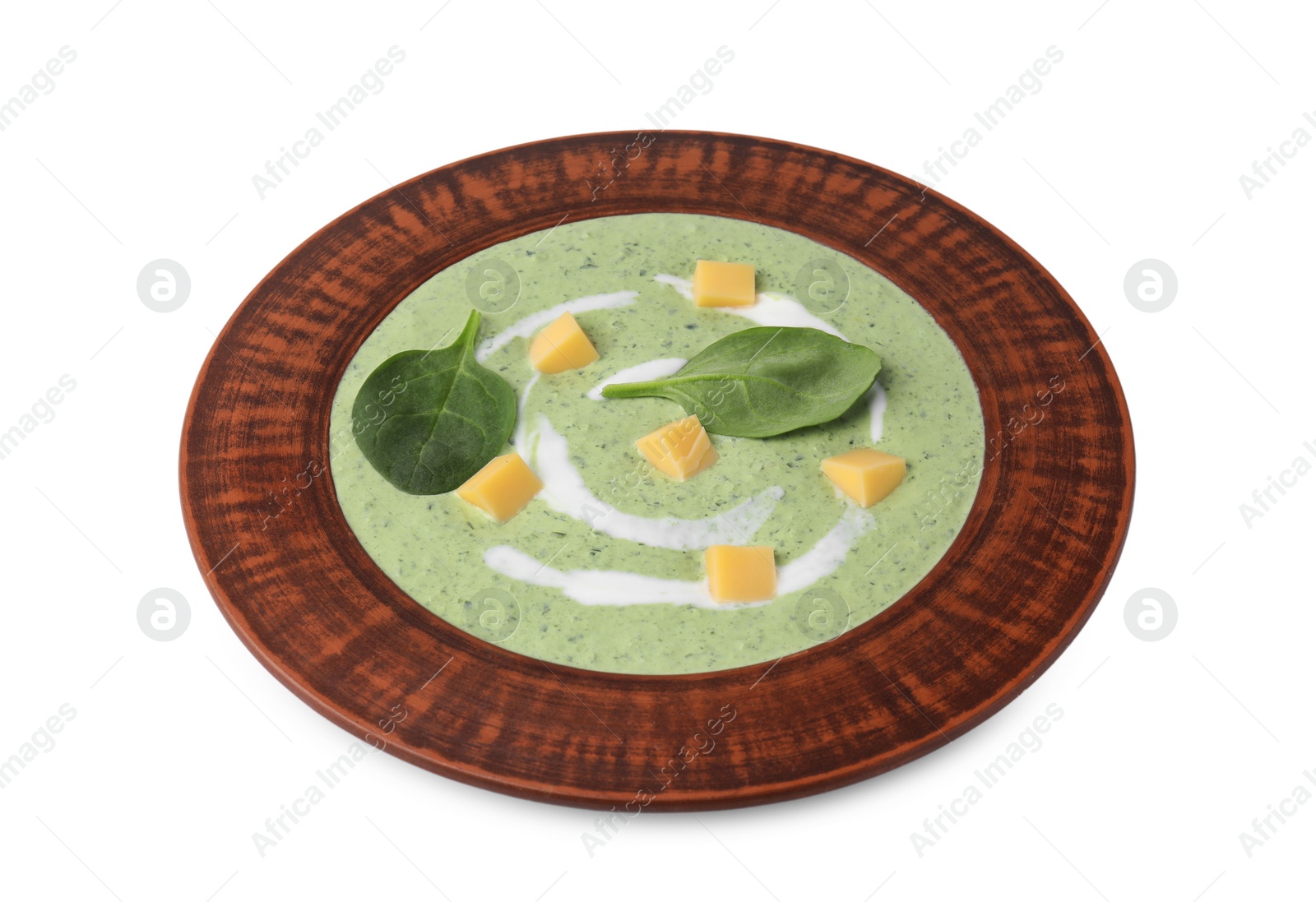 Photo of Delicious spinach cream soup with leaves and cheese in bowl isolated on white