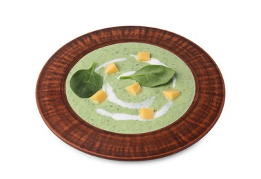 Photo of Delicious spinach cream soup with leaves and cheese in bowl isolated on white