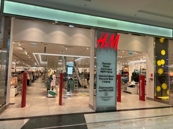Photo of Poland, Warsaw - July 12, 2022: Official H&M store in shopping mall