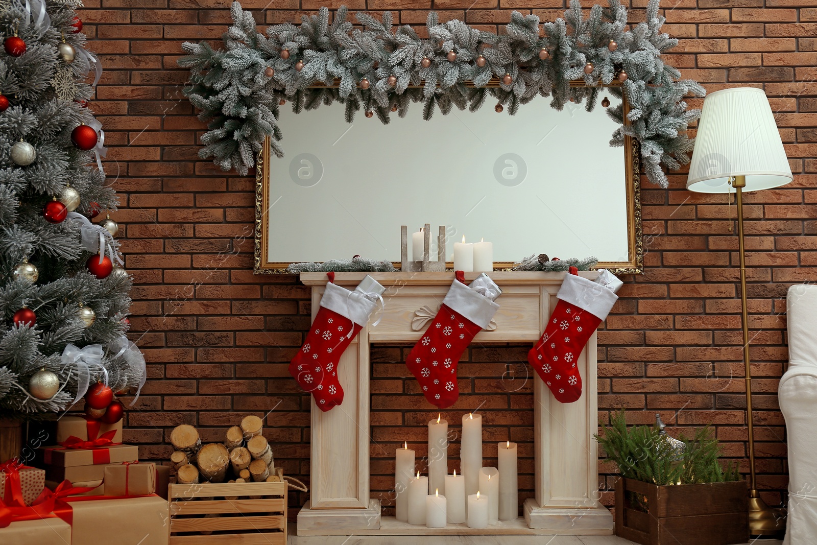 Photo of Stylish interior with beautiful Christmas tree and decorative fireplace