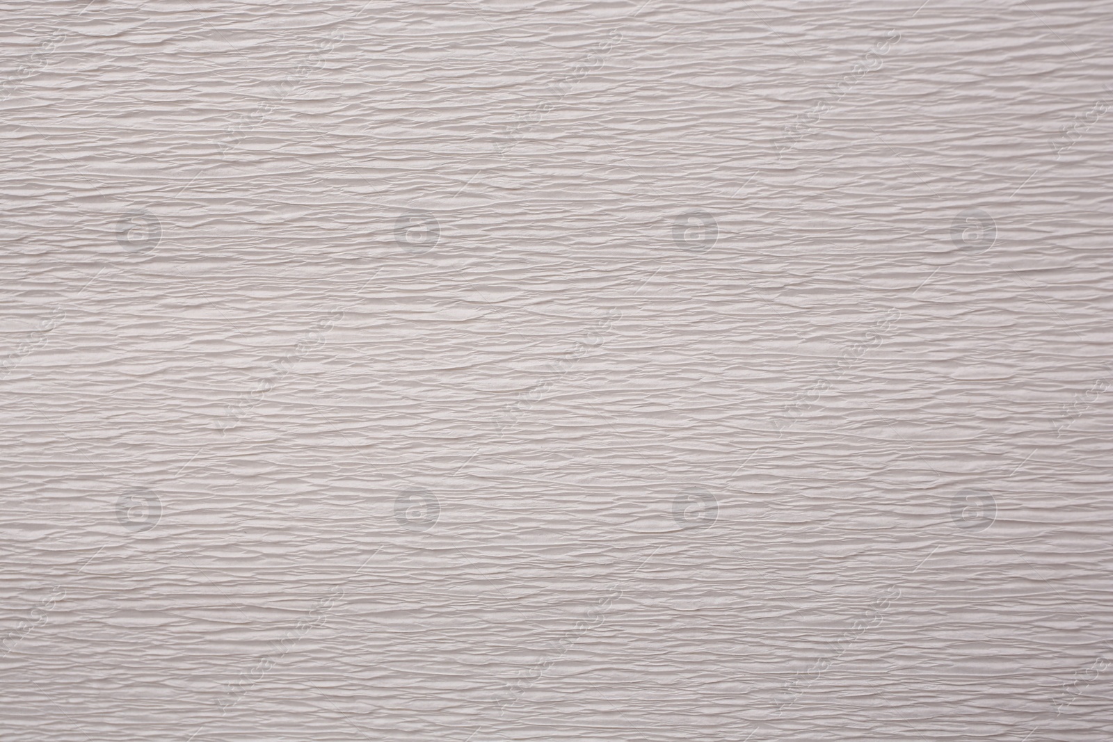 Photo of Texture of white paper sheet as background, closeup