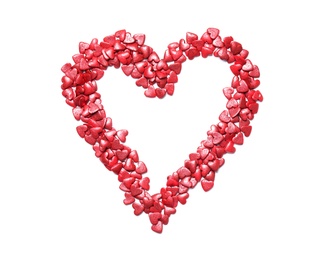 Heart made of sweet candies on white background, top view